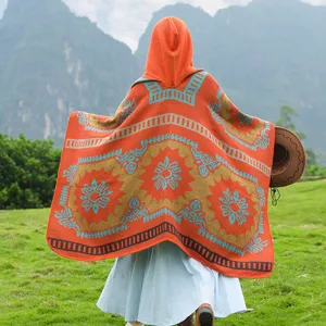 Retro ethnic style hooded knitted cape poncho for travel and outdoor photography.