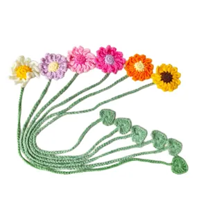 Handmade crochet flower bookmarks with long green stems, cute knitted floral page markers for books.