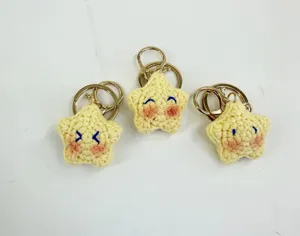 Llavero de estrella amarilla de ganchillo hecho a mano bonito bolso peluche
