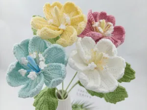 Handcrafted crochet flower bouquet close up detail multi color yarn floral home decor accent