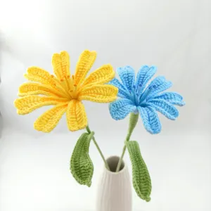 Handcrafted crochet flower detail view, beautiful knitted floral bouquet in vase closeup photography.