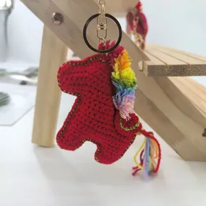 Handmade crochet red horse keychain with colorful mane, lucky pony bag charm for keys.