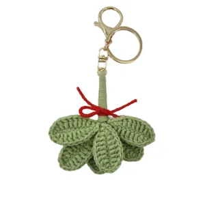 Handmade crochet green leaf keychain with red bow charm cute knitted bag hanging ornament gift