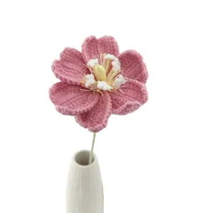 Handmade crochet pink flower gift in white ceramic vase, perfect for Valentine's Day.