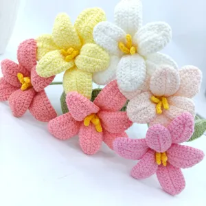 Handmade crochet blooming flower bouquet, exquisite woolen eternal flower detail view.