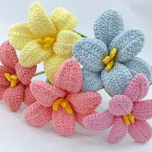 Handmade crochet flower detail, colorful wool floral craft close up view for decoration