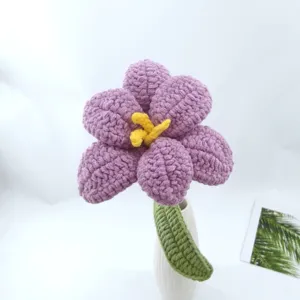 Handcrafted crochet purple flower detail view, beautiful wool everlasting flower gift for home decor.