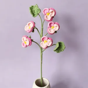 Handmade crochet pansy flower branch detail view, ideal for cozy home decoration and styling.