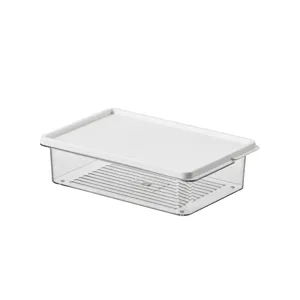 Transparente Kühlschrank-Aufbewahrungsbox aus Kunststoff mit weißem Deckel für Lebensmittel.