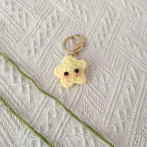 Handmade crochet yellow star keychain and cute bookmark, soft yarn pendant gift for daily use.