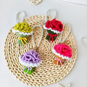 Handmade crochet flower bouquet keychain with pearl strap, cute knitted bag charm gift.