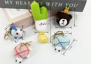 Handmade crochet keychain detail showcasing cute animal and plant charms for bags.