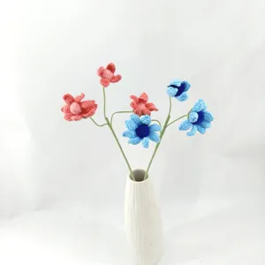 Handmade crochet flower bouquet in white ceramic vase, cute artificial floral gift decor.