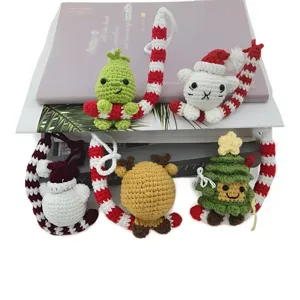 Handmade crochet Christmas plush keychains cute cartoon bag pendants festive gifts.
