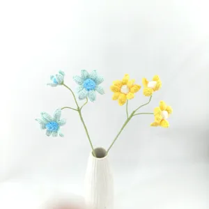 Handmade crochet flower bouquet knitted floral arrangement with a white ceramic vase