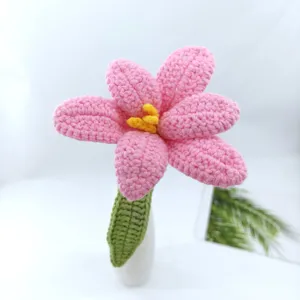 Handmade crochet pink tulip yarn flower detail view, perfect everlasting knitted bouquet gift.
