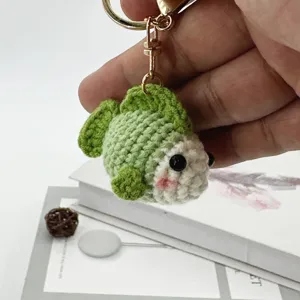 Portachiavi con piccolo pesce verde all'uncinetto fatto a mano ciondolo borsa carino