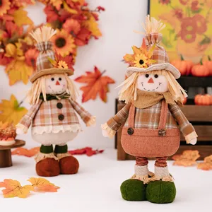 Thanksgiving autumn scarecrow doll ornament with hat and maple leaf decor for home and party.