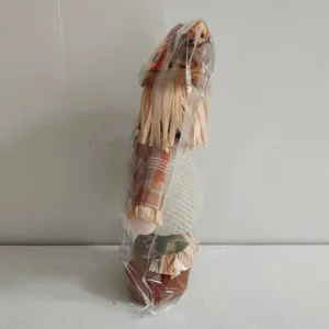 Thanksgiving scarecrow doll detail view, autumn harvest decoration plush standing toy.