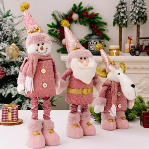 Ensemble de poupées en peluche de Noël rose, bonhomme de neige renne de bureau mignon.