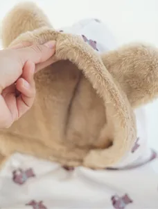 Thick plush pet blanket with cute bear ears and soft warm fleece lining detail view
