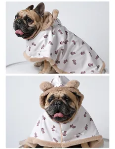 Detailed view of winter thick warm pet cloak with cute bear ears hood and plush trim.
