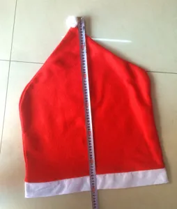 Red non-woven Christmas chair cover festive hat design dining room party decor size display