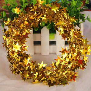 Gold Christmas tinsel garland with shiny stars, perfect for tree and holiday party home decor.