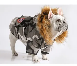 Warm camo dog winter coat with large faux fur collar, windproof pet parka jacket for cold weather.