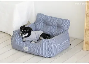 Close-up of blue and white striped pet car bed with cozy sofa design and cushion details.