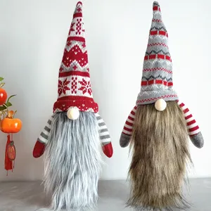 Cute Christmas gnome plush dolls with long knitted hats and soft beards for holiday decor.