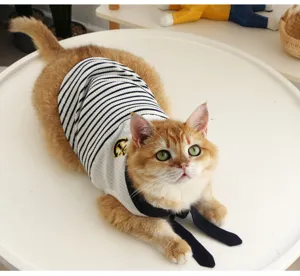 Close-up detail of pet sailor vest with bow tie and anchor embroidery for cats and dogs.
