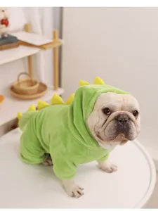 Cute flannel dinosaur pet pajamas for dogs and cats, warm four-legged jumpsuit apparel.