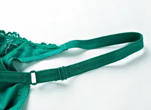 Close up view of the dark green lace bra strap with adjustable buckle, high quality and soft.