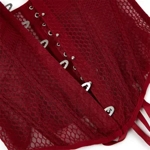 Close-up detail of the red mesh corset featuring metal front busk clasps and texture.