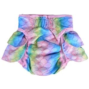 Pet sanitary pants detail showing colorful mermaid scale pattern, elastic waist and ruffles.