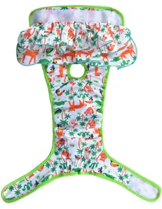 Detailed view of pet sanitary pants featuring jungle animal print, green ruffles and edges.