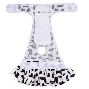 Detail view of breathable mesh dog sanitary pants with cute cow print, tail hole and ruffles.