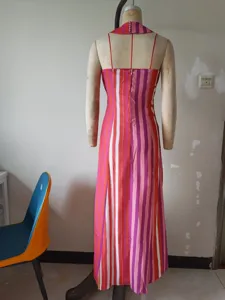 Detailed back view of women summer halter sleeveless stripe long dress elegant multi color design.