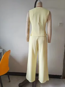 Women solid yellow sleeveless vest and wide-leg trousers suit office summer outfit