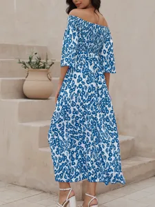 Elegant off-shoulder blue floral print maxi dress designed with a smocked bodice for women.