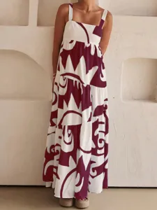 Robe longue d'été à bretelles avec imprimé abstrait audacieux, col carré et volants.