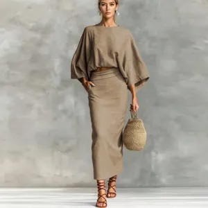 Cotton linen two-piece set featuring a batwing sleeve top and matching long skirt.