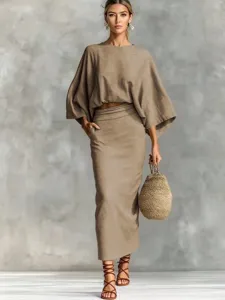 Detailed view of the cotton linen two-piece set with batwing top and split pocket skirt.