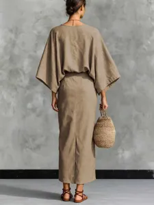 Linen two-piece set for women featuring a batwing sleeve top and a split long skirt.