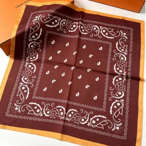 French old money style square silk scarf with elegant paisley pattern and chic contrast border.