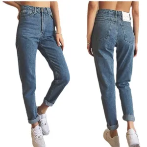 High-waisted casual blue denim jeans for women, comfortable straight-leg fit with cuffed hem.