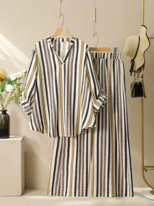Striped V-neck blouse and wide-leg pants set, elegant casual two-piece outfit for summer.