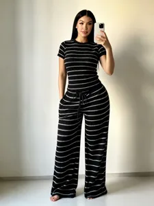 Striped knit short sleeve top and wide leg pants two piece set detail view, casual summer outfit.