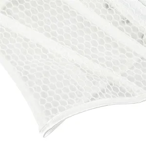Detailed view of white breathable honeycomb mesh shaping top fabric, soft and comfortable texture.